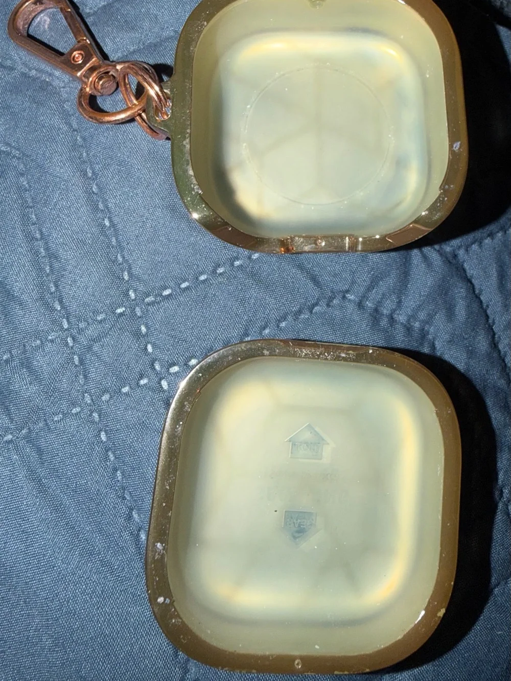 Samsung Earbuds with Charging Case in Rose Copper and Carrying case included.